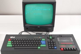 Amstrad CPC 464 vintage computer with green monochrome monitor GT 65