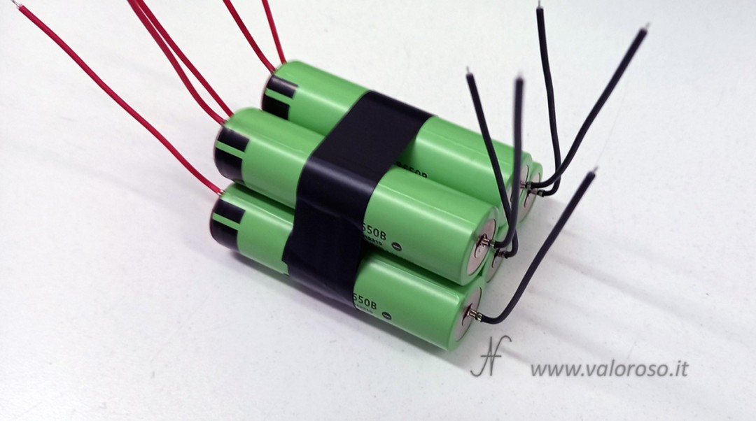 Mechanical arrangement of 18650 Li-Ion cells before connecting them in series. Cells placed side by side and stopped with adhesive tape.
