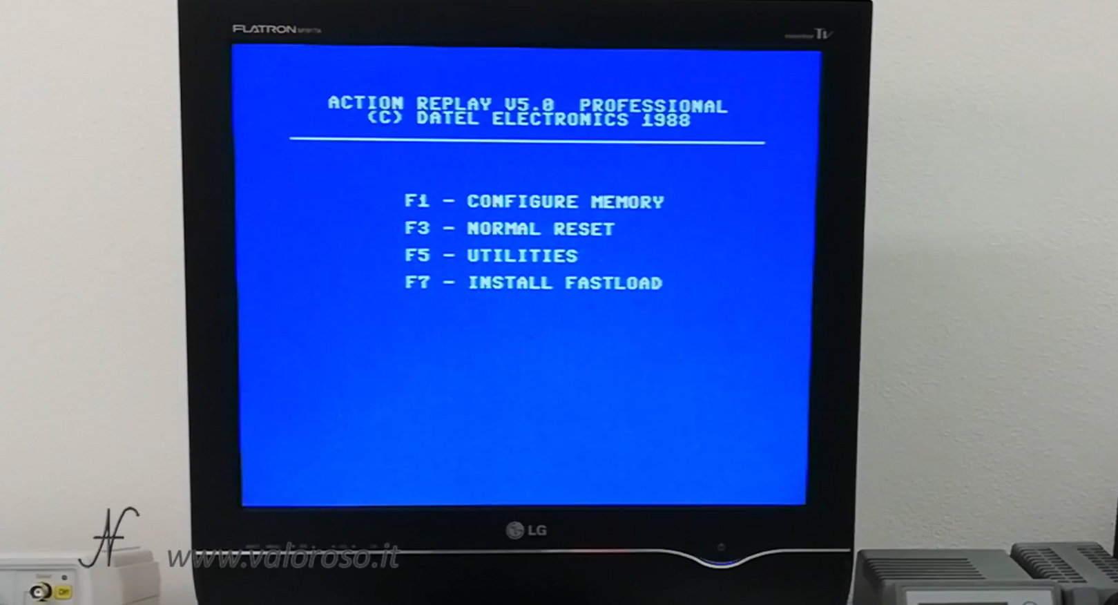 Datel Action Replay 1988, Commodore 64, menu avvio, configure memory, normal reset, utilities, install fastload