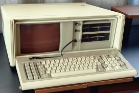 PC portatile trasportabile, IBM 5155. Anno: 1984. Linguaggio di programmazione di default: Basic. Tastiera meccanica QWERTY (layout italiano), 83 tasti. CPU: Intel 8088, 4.77 MHz, con possibilità di espansione per coprocessore matematico 8087. RAM: 512 KB (minimo 256 KB, espandibile fino a 640 KB). ROM: 40 KB. Modalità testo: 25 righe x 80 colonne. Modalità grafica: CGA, 320 x 200 pixel, 640 x 200 pixel. Monitor: integrato, CRT 9", color ambra. Suono: beep. Dimensioni e peso: 50 x 43 x 20 cm, 13.6 Kg. Porta seriale e parallela. Porte di espansione: 7. Drive: 2 x 5" 1/4 dischi floppy (360 KB). Sistema operativo: PC-DOS 2.1