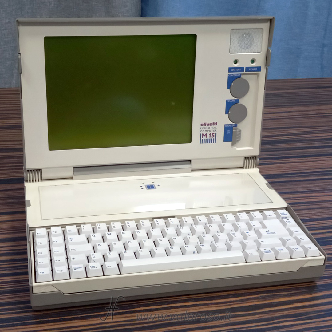 Olivetti M15, computer portatile anni 80, vintage notebook, laptop, display LCD monocromatico. TECHNICAL CHARACTERISTICS

CPU:	            80C88 (4.77 MHz)

ROM:	            16K bytes

RAM:	            User RAM: 256K bytes, 512K bytes depending on con-
                    figuration.
Video RAM:          16K bytes

CLOCK:	            Battery-backed clock/calender

Minifloppy	    Two 3.5"disk drives.
disk drive:	    Diskettes used:
                    double sided, double density, 135 t.p.i.
No. of heads:       2
No. of cylinders (tracks): 80
Data transfer rate: 250K bits/sec.

Power supply to	    5 V DC (from Power Unit)
Central Unit:	    5 V DC (from battery)

System power	    max. 20 W
consumption:

Display:	    1:2.4 aspect ratio
                    Liquid crystal display (LCD)
                    Alphanumeric:
                    25 lines of 80 characters
                    25 lines of 40 characters (by selection)
                    Graphic:
                    640 x 200 pixels
                    320 x 200 pixels

Keyboard:	    78 keys, including:
                    10 Function keys
                    Numeric keypad (integrated into alphanumeric area) 
		    LEDs indicating numeric keypad and upper case mode

Battery:	    Ni-Cd-Battery set, 5 V
                    500 charge/recharge cycles
                    6 hours operation with 10 % use of the disk drives 
		    8 hours recharging time

Interfaces:	    Parallel (Centronics)
                    Serial (RS 232C)
                    Interface for the optional 5.25"disk drive
                    Common Bus

31/E
	


Ambient	Temperature range: from 5 to 35º C (41 to 95º F).
                           conditions	
Relative Humidity:  from 20 to 80 per cent, non condensing.
Altitude (max.):    operating 3000 m. (10,000 feet),
                    non-operating 10,000 m. (33,000 feet)

Dimensions/	    385 x 276 x 72 mm.
Weight:	            (15.15 x 10.8 x 2.83 inches)
                    5,700 Kg (12.5 Ibs).

AC Adapter:	    Input: AC (voltage, frequency according to the label on the
                    AC-Adapter)
Output:             5 V DC for battery charging,
                    5 V DC to system
                    AC supply current variations tolerated:
                    Voltage +/-10 per cent
                    Frequency +/-1 per cent

32/E	Installation and Operations Guide